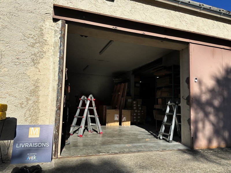 porte sectionnelle industrielle vitree avec portillon intégré HÖRMANN sur Forcalquier